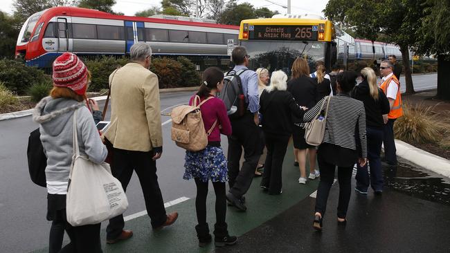 Passengers are diverted to buses after their train became stuck between the Hove and Brighton stations. Picture: Dean Martin