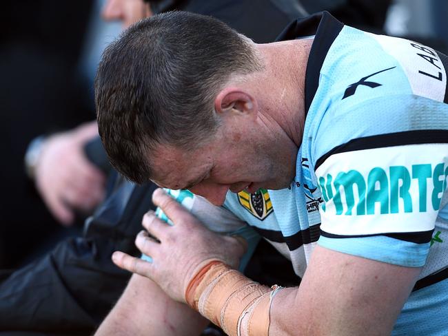 SYDNEY, AUSTRALIA - JULY 13: Sharks captain Paul Gallen is injured during the round 18 NRL match between the Cronulla Sharks and the Newcastle Knights at Remondis Stadium on July 13, 2014 in Sydney, Australia. (Photo by Renee McKay/Getty Images)