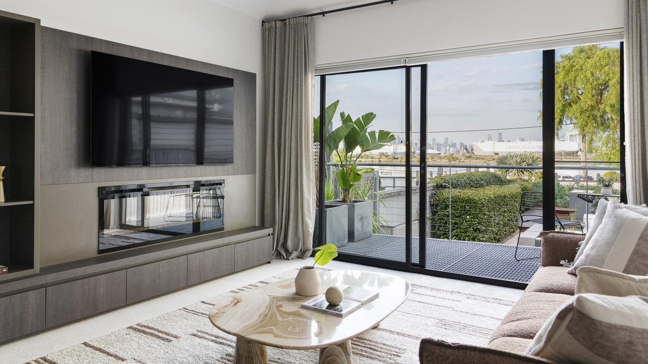 The living area looks out to the balcony.