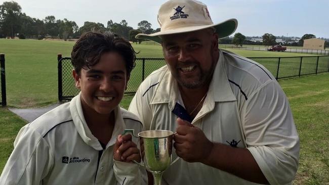 Shane D’Rosario with his son Jono enjoy the spoils of a Turf 3 premiership. Picture: Supplied