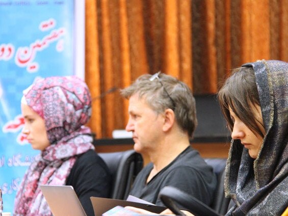 Iran's University of Religions and Denominations published this image of Kylie Moore-Gilbert (L) at her study group in August 2018.