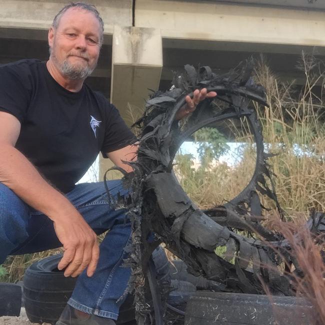 TIDY's Dave Dudley was disgusted by the amount of illegally dumped rubbish he was finding at the Bohle River. Picture: Supplied.