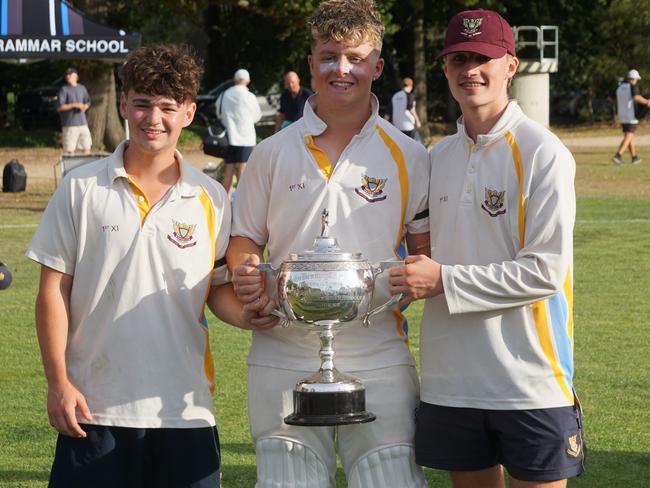 Hayden Kenny (middle) and his Marcellin College teammates celebrate winning the AGSV first XI title. Picture: Supplied.