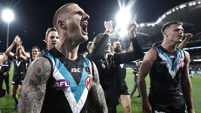 Hamish Hartlett celebrates after the Power’s win against Geelong. Picture: Ryan Pierse/Getty