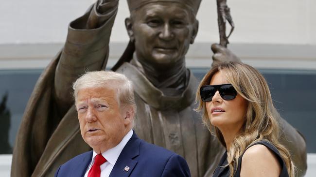 Donald and Melania Trump visit Saint John Paul II National Shrine in Washington. Picture: AP.