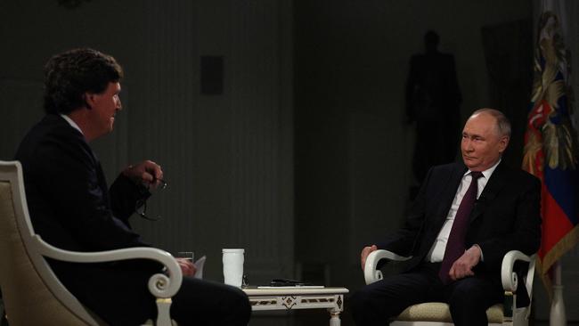 Russia's President Vladimir Putin gives an interview to US talk show host Tucker Carlson at the Kremlin in Moscow.