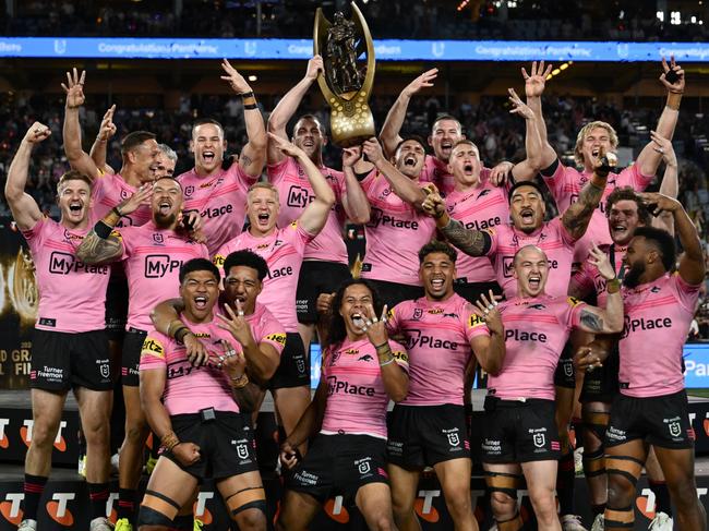 SYDNEY, AUSTRALIA - OCTOBER 06: Isaah Yeo and Nathan Cleary of the Panthers hold aloft the Provan-Summons Trophy after winning the 2024 NRL Grand Final match between the Melbourne Storm and the Penrith Panthers at Accor Stadium on October 06, 2024, in Sydney, Australia. (Photo by Quinn Rooney/Getty Images)