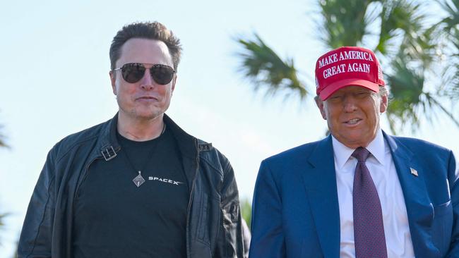 BROWNSVILLE, TEXAS - NOVEMBER 19: U.S. President-elect Donald Trump greets Elon Musk as he arrives to attend a viewing of the launch of the sixth test flight of the SpaceX Starship rocket on November 19, 2024 in Brownsville, Texas. SpaceXâs billionaire owner, Elon Musk, a Trump confidante, has been tapped to lead the new Department of Government Efficiency alongside former presidential candidate Vivek Ramaswamy.   Brandon Bell/Getty Images/AFP (Photo by Brandon Bell / GETTY IMAGES NORTH AMERICA / Getty Images via AFP)