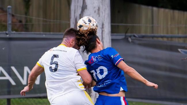 Darryl Bright (left) and Ken Akamatsu (right) competing for a header Credit: Peninsula Power