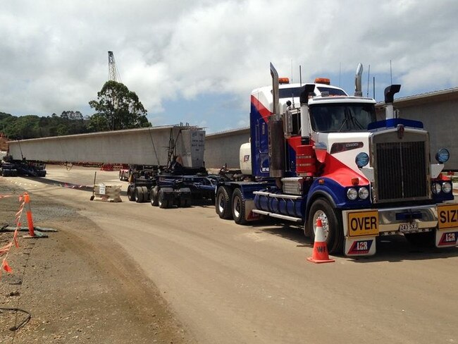 Large concrete girders are being delivered for the Pacific Highway upgrade.