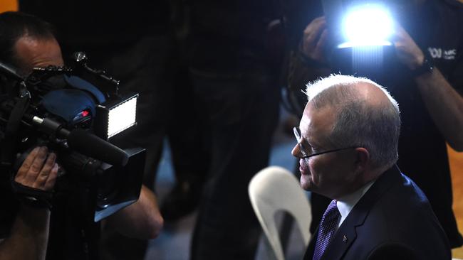 Treasurer Scott Morrison speaks to journalists ahead of his Budget speech. Picture: AAP Image/Mick Tsikas