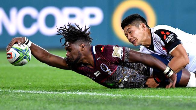 Moses Sorovi reaches out to score for the Reds. Picture: Getty