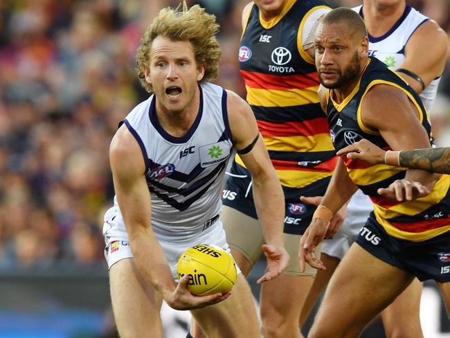 David Mundy of the Dockers and Cameron Ellis-Yolmen of the Crows during the Round 7 AFL match between the Adelaide Crows and the Fremantle Dockers at the Adelaide Oval in Adelaide, Sunday, May 5, 2019. (AAP Image/David Mariuz) NO ARCHIVING, EDITORIAL USE ONLY