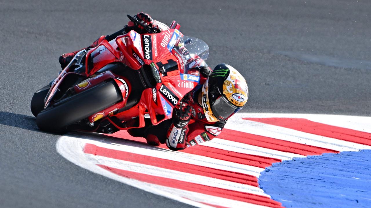 TOPSHOT - Ducati Lenovo Team's Italian rider Francesco Bagnaia rides during the qualifying session of the Emilia-Romagna MotoGP Grand Prix at the Misano World Circuit Marco-Simoncelli in Misano Adriatico, on September 21, 2024. (Photo by Andreas SOLARO / AFP)