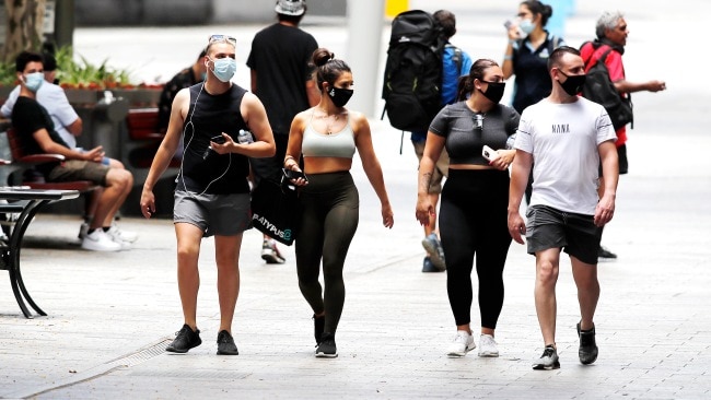 Ms Palaszczuk urged residents to wear face masks across all settings until 90 per cent of the state is double dosed. Picture: NCA NewsWire / Josh Woning