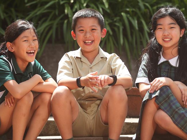 Amy Jung, Bernard Yu and Grace Chang who are Year 4 students at Holy Family Catholic Primary School Lindfield, Sydney. Story about how NAPLAN results for kids with a language background other than English are outstanding this year. Picture: Brett Costello