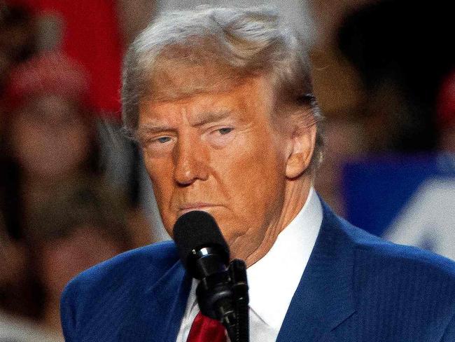 (FILES) Former US President and Republican presidential candidate Donald Trump speaks during a campaign rally at Mullet Arena in Tempe, Arizona on October 24, 2024. Donald Trump won the state of Arizona in this week's US presidential election, US TV networks projected on November 9, 2024, completing the Republican's sweep of all seven swing states. (Photo by Rebecca NOBLE / AFP)