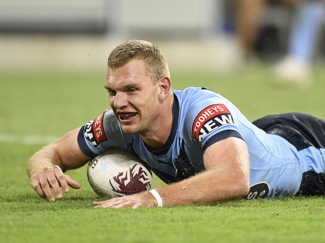 TOWNSVILLE, AUSTRALIA - JUNE 09: Tom Trbojevic of the Blues scores a try during game one of the 2021 State of Origin series between the New South Wales Blues and the Queensland Maroons at Queensland Country Bank Stadium on June 09, 2021 in Townsville, Australia. (Photo by Ian Hitchcock/Getty Images)