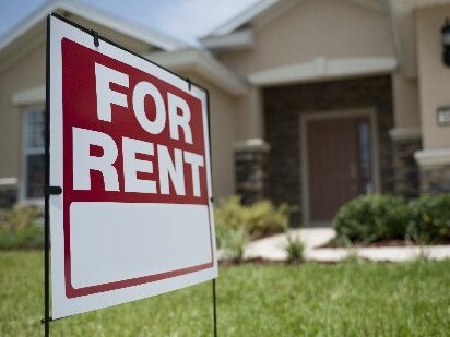 For Rent sign in front of new house
