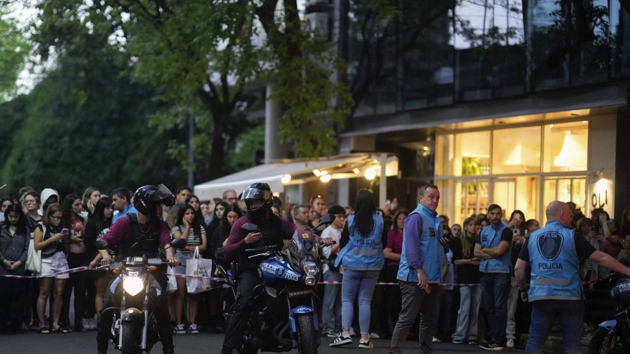 Buenos Aires police officers cordon off the hotel. Picture: AP Photo/Natacha Pisarenko