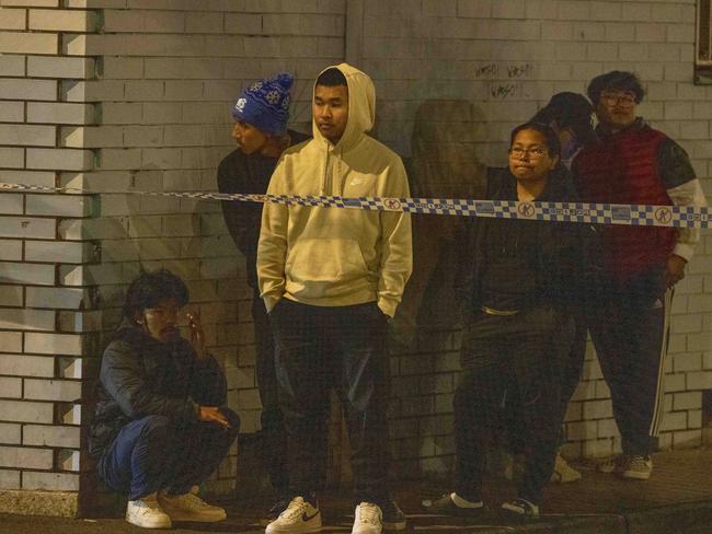 Relatives of the victim gathered at the station after the stabbing. Picture: Wayne Taylor