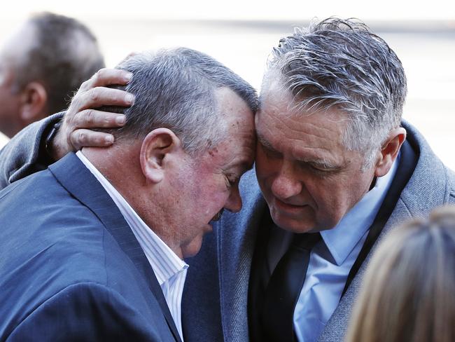 DAILY TELEGRAPH - 4/6/21State funeral service for Bob "Bozo" Fulton at St Mary's Cathedral in Sydney today. Ray Hadley hugs Darryl Brohman.  Picture: Sam Ruttyn