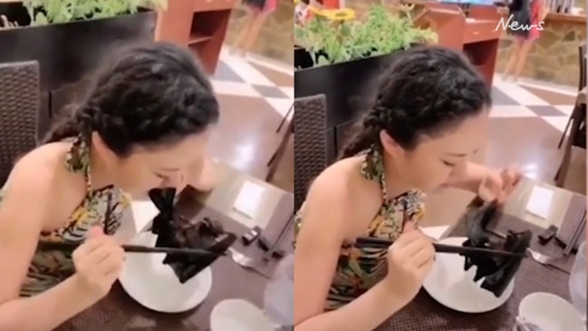 Watch: Chinese woman devours a bat while at a market