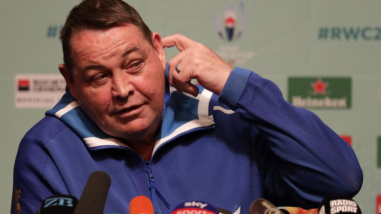 New Zealand coach Steve Hansen answers questions from reporters in Tokyo.