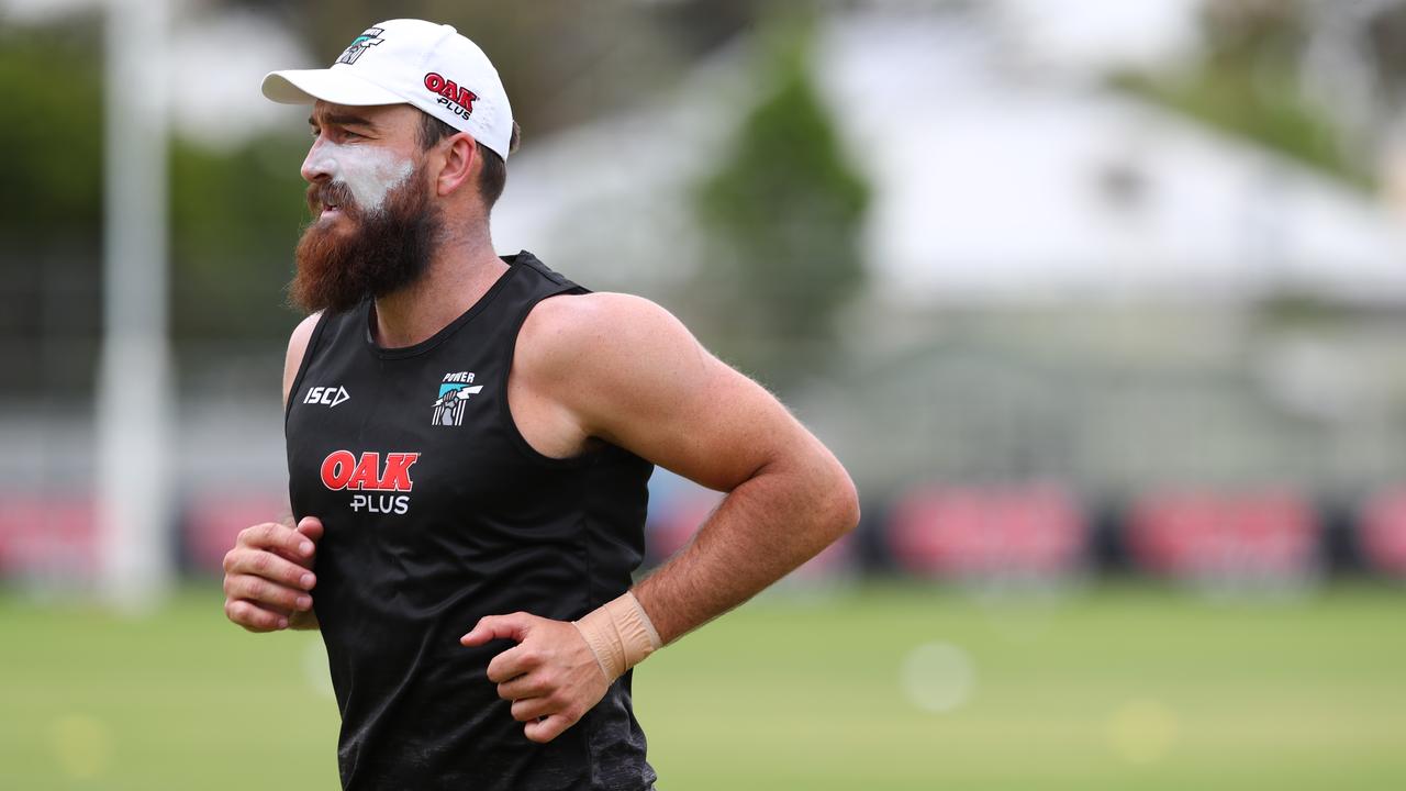 Port Adelaide's Charlie Dixon has a short jog during pre-season training at Alberton Oval last month. Picture: Tait Schmaal