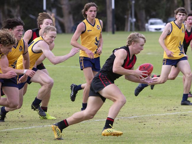 ADELAIDE, AUSTRALIA - ADVERTISER Photos MAY 15, 2021: Rostrevor Player #26 Kade Maddigan kicks a goal. Rostrevor College vÃs  Scotch College in round two of this year's College Football season, 2021 at Rostrevor College ground Oval, Rostrevor, SA.. Picture Emma Brasier