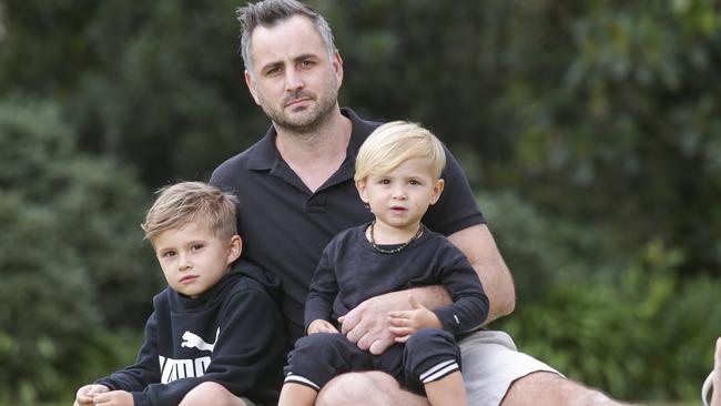 Former AFL player Ty Zantuck with his kids Jagger, 6, and Zepplin, 2. Picture: Wayne Taylor