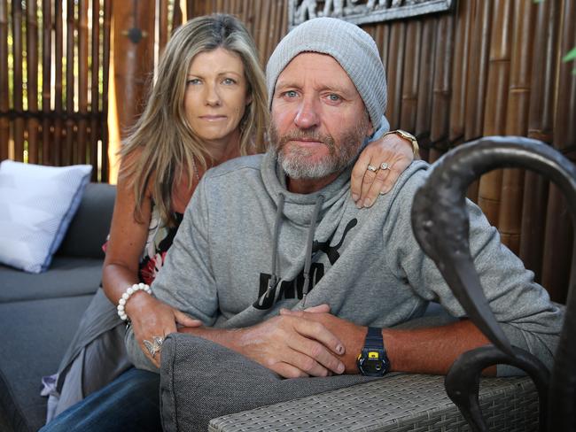 Ex Essendon and Geelong footballer John Barnes and his wife Rowena at their Essendon home. Picture: Michael Klein