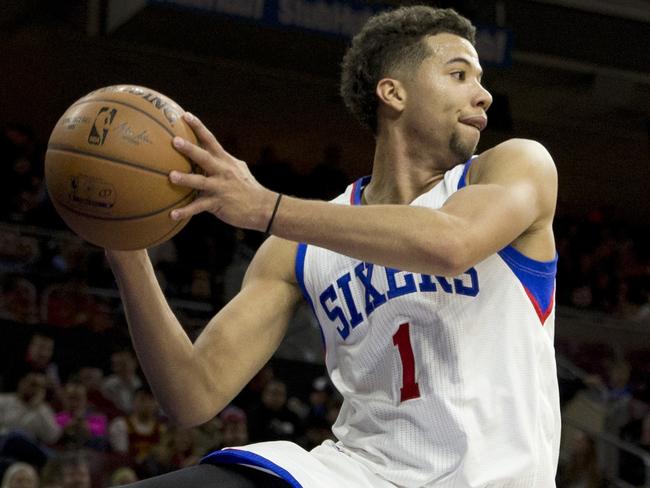 PHILADELPHIA, PA - JANUARY 5: Michael Carter-Williams #1 of the Philadelphia 76ers saves the ball from going out of bounds against the Cleveland Cavaliers on January 5, 2015 at the Wells Fargo Center in Philadelphia, Pennsylvania. The 76ers defeated the Cavaliers 95-92 NOTE TO USER: User expressly acknowledges and agrees that, by downloading and or using this photograph, User is consenting to the terms and conditions of the Getty Images License Agreement (Photo by Mitchell Leff/Getty Images)