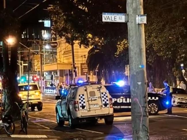 A teenager who allegedly attacked a man with a machete in an armed robbery in Melbourne’s southeast has been slapped with a string of charges.Police allege a 39-year-old man walking down Barkly Street in St Kilda was approached by a male and female about 9.15pm on Saturday, who allegedly demanded the man hand over his car keys.The male offender allegedly assaulted the 39-year-old with a machete before he and the female fled the scene empty-handed. Picture: 9News