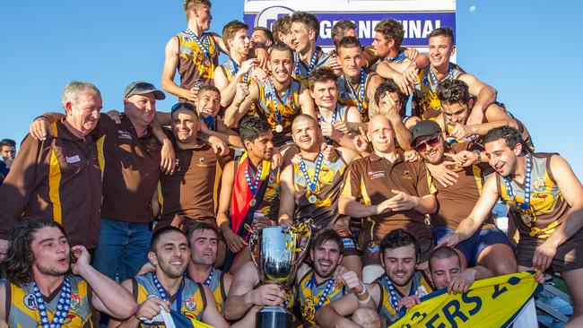 Thomastown celebrate with the grand final trophy. Picture: Sarah Matray