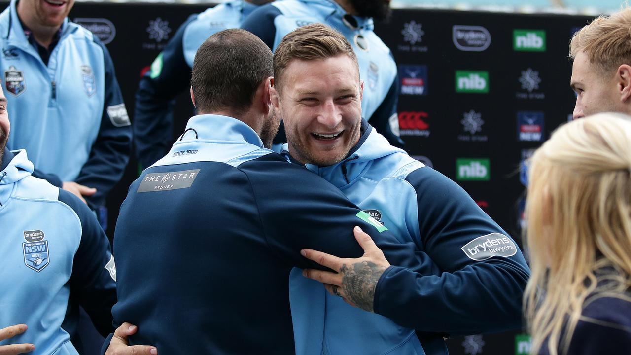NSW's Tariq Sims is hugged by Boyd Cordner after the NSW Blues State of Origin team announcement for Game 3 and coaching clinic at ANZ Stadium, Sydney. Picture: Brett Costello