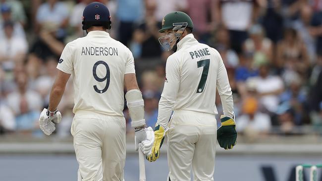 Tim Paine speaks to James Anderson after he was last man out in England’s innings. Picture: Getty Images