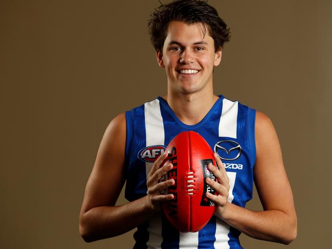 North Melbourne draftee Curtis Taylor shows off his new colours. Picture: Getty Images.