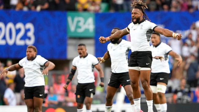 Fiji's players perform a Cibi (a Fijian war dance) ahead of the France 2023 Rugby World Cup Pool C match between Australia and Fiji at Stade Geoffroy-Guichard in Saint-Etienne, south-eastern France on September 17, 2023. (Photo by Francis BOMPARD / AFP)