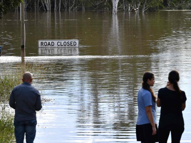 More flood-stricken communities given the all clear