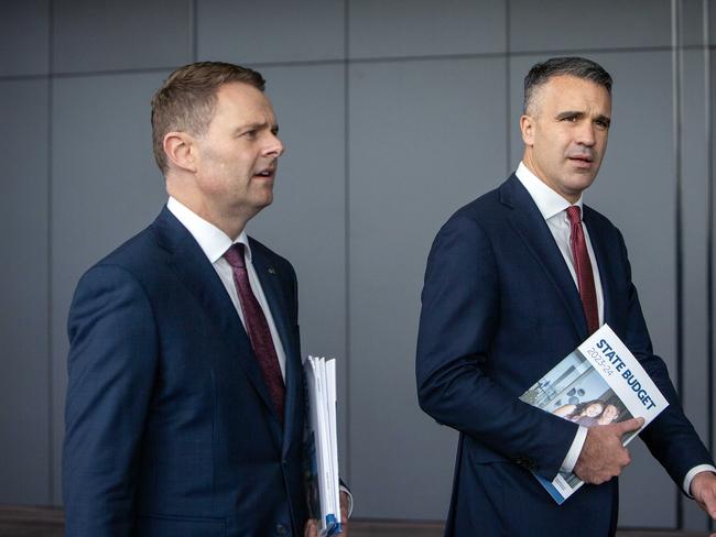 ADELAIDE, AUSTRALIA - NewsWire Photos - JUNE 15, 2023: South Australian Premier Peter Malinauskas and Treasurer Stephen Mullighan with the budget paper outside SA Parliment House and walking to the Convention Centre on North Terrace. Picture: NCA NewsWire / Emma Brasier.