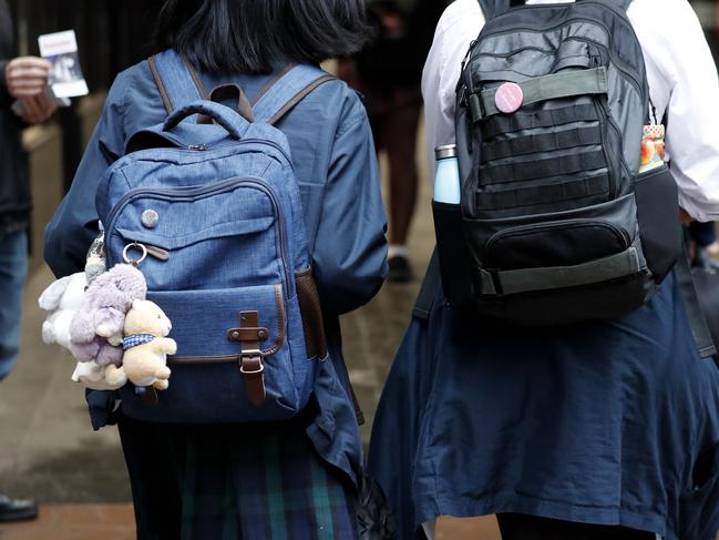 GENERIC AUSTRALIAN STUDENTS - BACK VIEW -  SYDNEY, AUSTRALIA - NewsWire Photos MAY 4, 2021: Students travel home after school. Picture: NCA NewsWire / Nikki Short