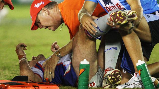 Medical staff treat Ciraldo after the injury at Shark Park.