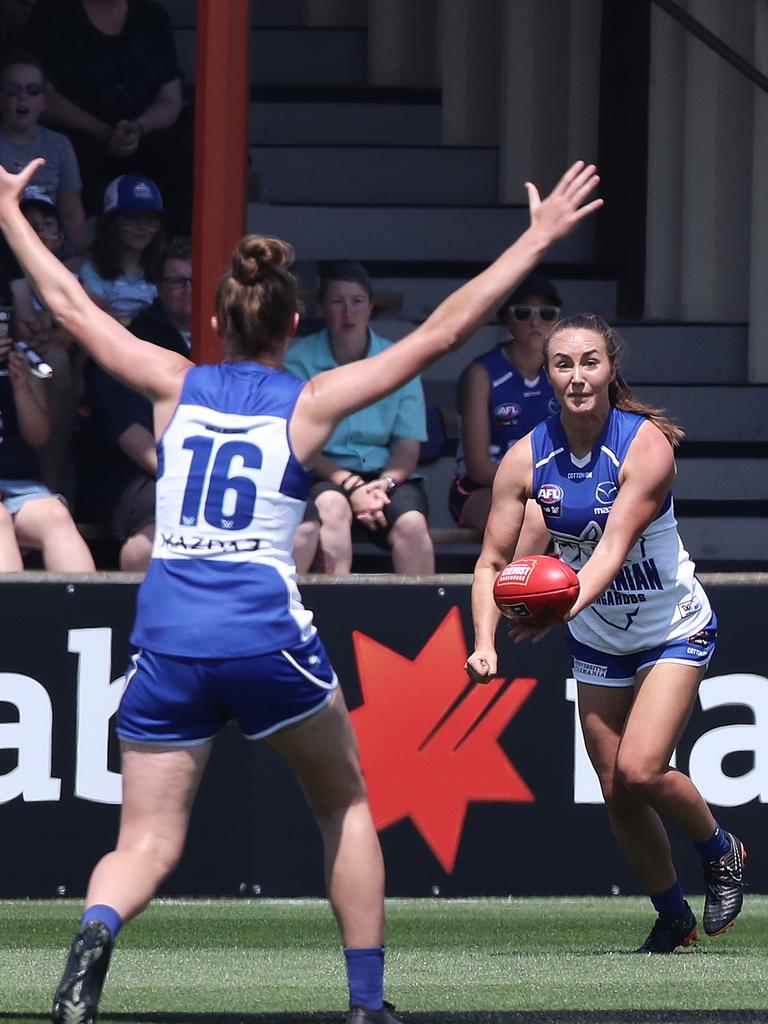 North Melbourne’s Nicole Bresnehan looks to handball to a team-mate. Picture: LUKE BOWDEN