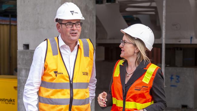 Premier Daniel Andrews (left) and Minister for Transport Infrastructure Jacinta Allen prepare to speak to media at a press conference at the entry point for the West Gate Tunnel boring machine in Footscray. Picture: AAP