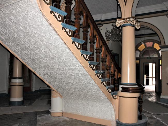 Pressed tin under the main staircase.