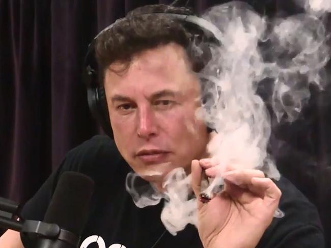 Tesla CEO Elon Musk appeared to smoke marijuana during a lengthy interview with comedian Joe Rogan that covered topics ranging from the dangers of artificial intelligence to the CEO's use of Twitter. PHOTO: THE JOE ROGAN EXPERIENCE