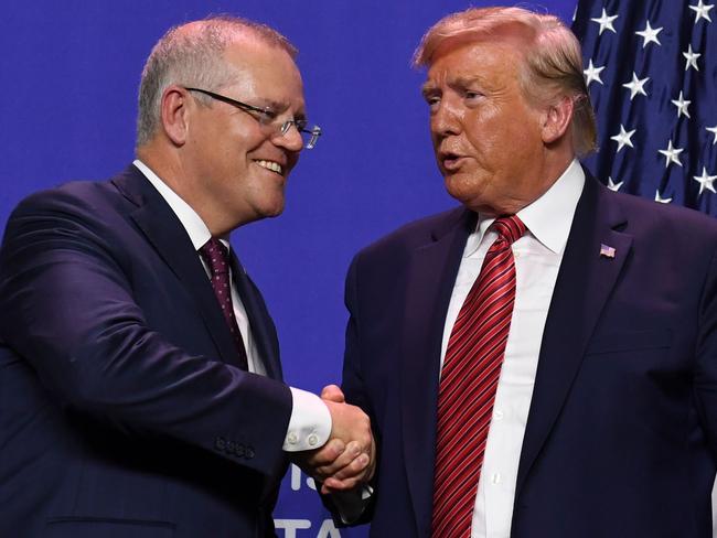 US President Donald Trump and Prime Minister Scott Morrison shake hands during a visit to Pratt Industries plant opening in Wapakoneta, Ohio last year.