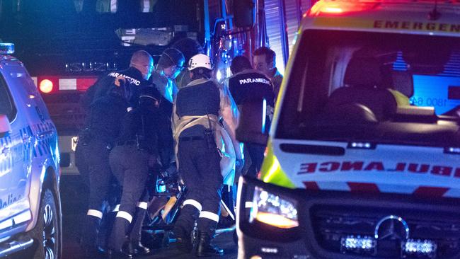 Police and paramedics on Sunday night. Picture: Tony Gough