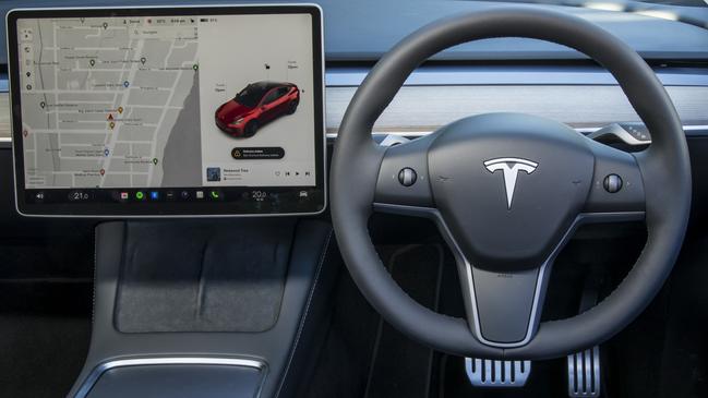 The Tesla Model Y Performance has metallic pedals. Photo: Mark Bean.